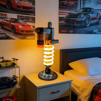 Justerbar LED-lampa med stötdämpardesign